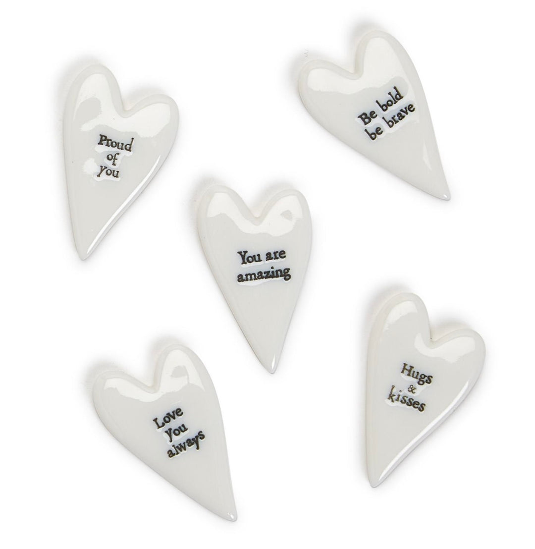 Set of five white Small Heart Pebbles, each with a unique uplifting phrase in black text. Available size: small.