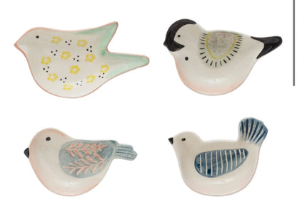 Set of four hand-painted stoneware bird dishes, each uniquely shaped with yellow flower and blue leaf designs. Sizes: assorted.