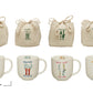 This set includes four canvas drawstring bags and four 4-inch Stoneware Mugs. Each item is adorned with unique botanical and bee-themed designs along with phrases such as "bee happy" and "talk dirt to me." The mugs are 4 inches in size, perfect for a generous cup of tea or coffee.