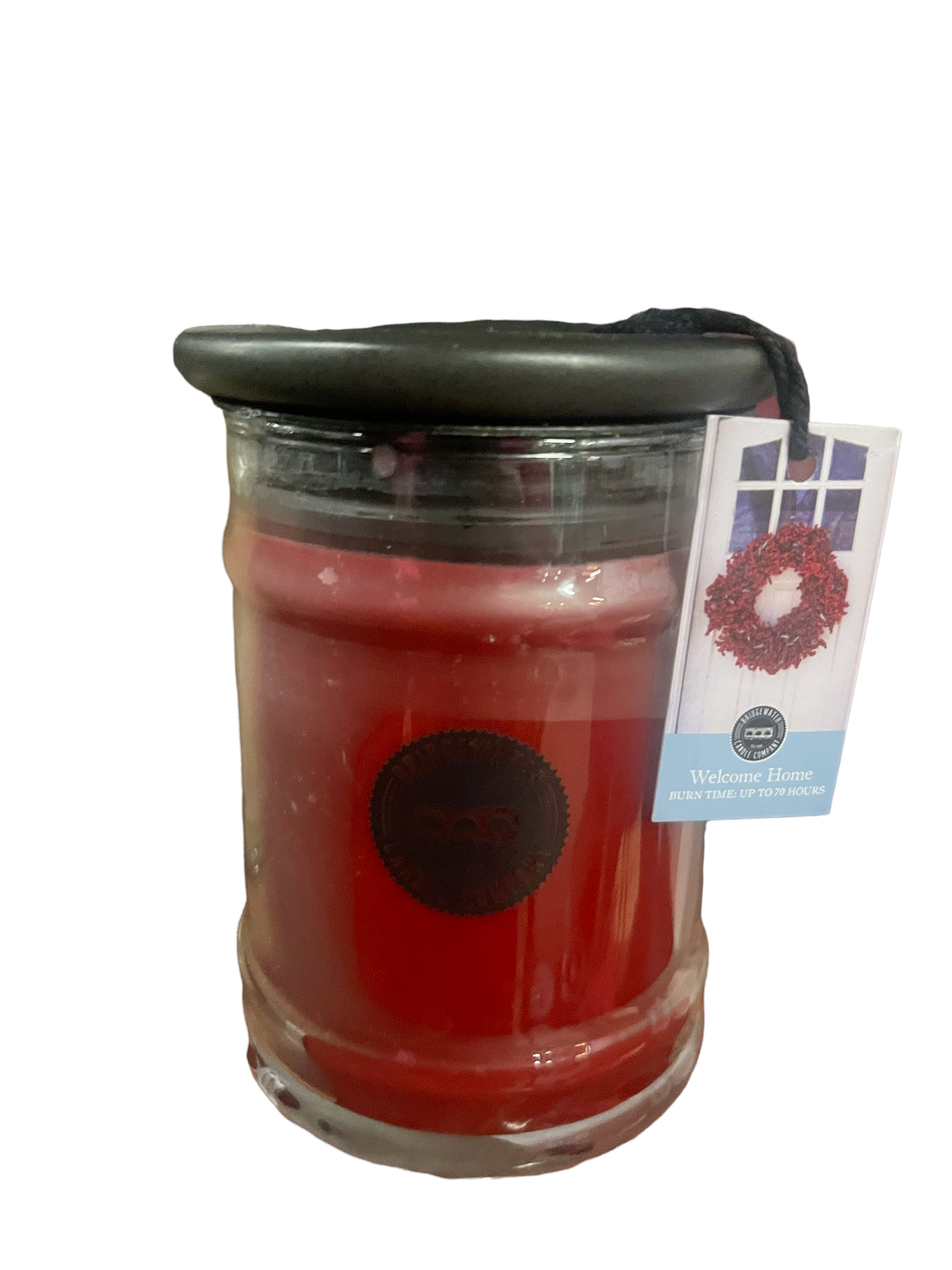 Partially burned Bridgewater Welcome Home Candle in red jar with dark lid and wreath label; available in multiple sizes.