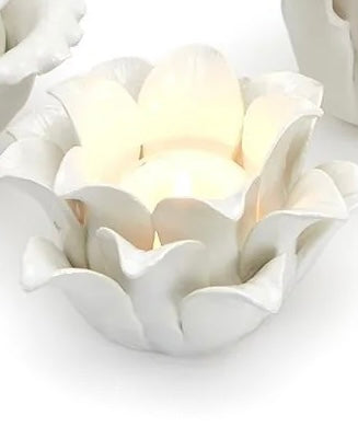 White ceramic succulent-shaped tealight holders, available in small and large sizes.