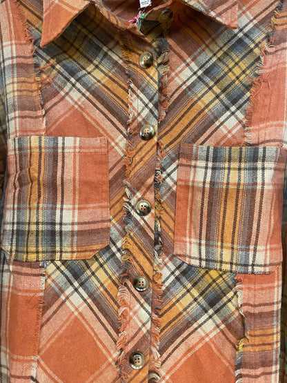 Plaid Rust Mix Mineral Wash Top with orange, yellow, white plaid, chest pockets, brown buttons. Sizes: S-XL.