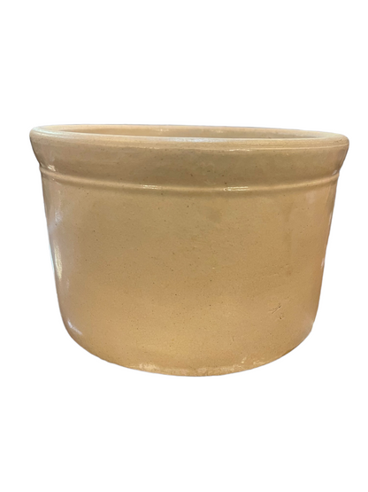 Beige, round Stoneware Crock with smooth surface and flared rim. Available in 1qt, 2qt, and 3qt sizes.