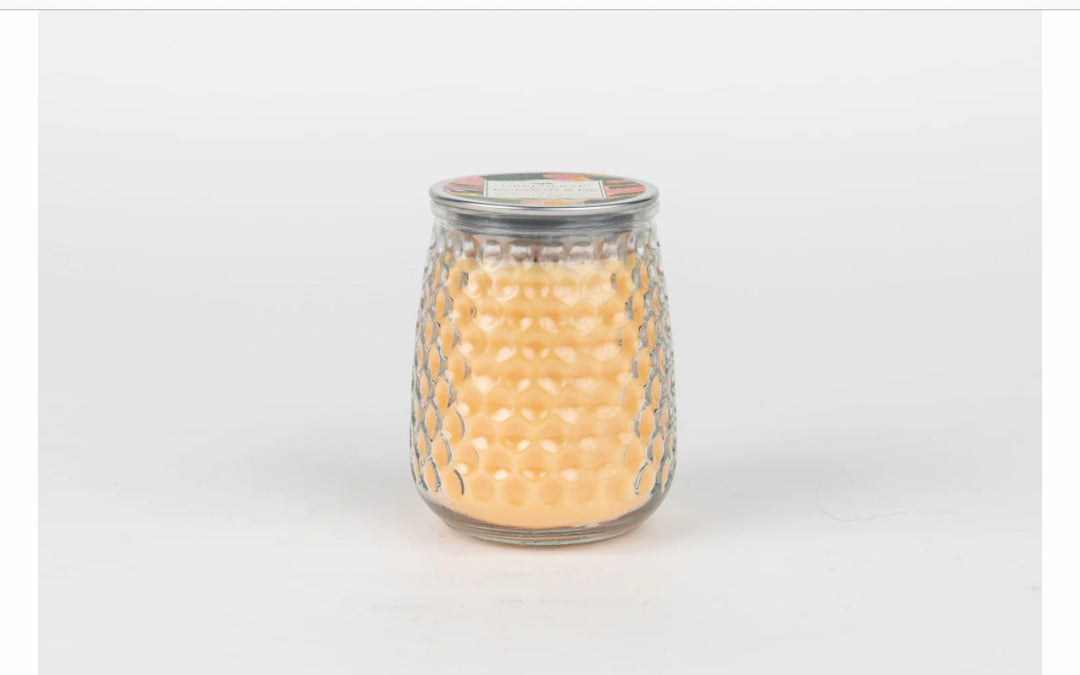 Glass jar with honeycomb pattern, pale yellow wax, metal lid. Gooseberry &amp; Fig Candle GLG915565. Size options available.