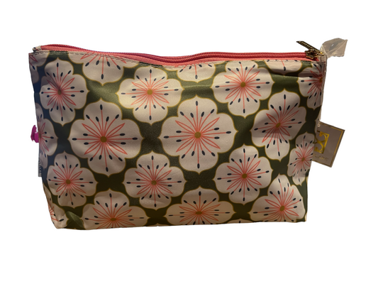 Travel Pouch with pink zipper, floral pattern on green, small side tag. Available sizes: Small, Medium, Large.