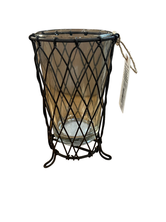 Small, brown-tinted glass candle holder in black wire diamond pattern with side tag; available in multiple sizes.