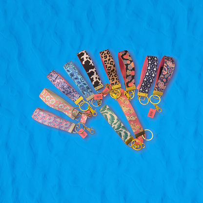 Simply Southern Key Fobs 0122: fabric with floral, animal, or geometric prints, gold/silver clasp. Size options not shown.