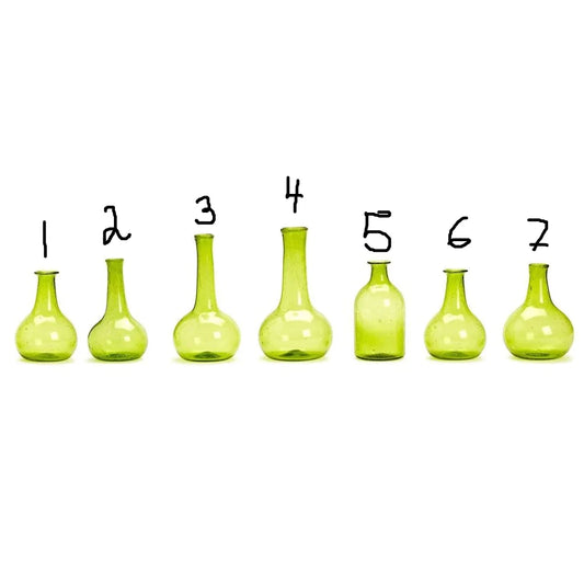 Seven Verdigris Bottles—green recycled glass, vintage style, assorted shapes and heights; available in multiple sizes.