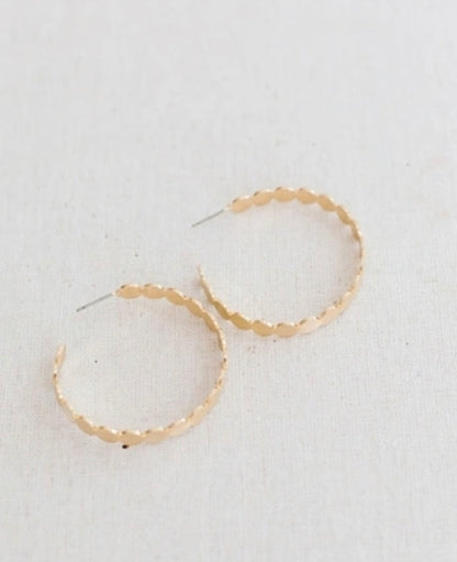 Michelle McDowell gold hoop earrings with scalloped, textured design. Available in small, medium, and large sizes.