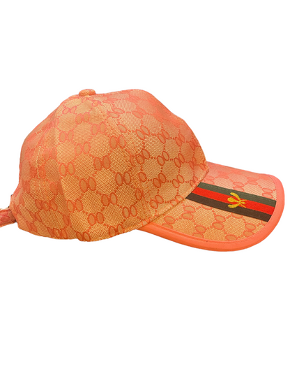 Orange and tan adjustable cap with pattern, green and red stripe, yellow bee emblem. Sizes: S/M, L/XL.