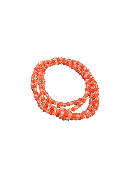 The Game Day 5 Strand Bead Bracelet has coiled strands of small orange and clear beads. Available in one adjustable size.