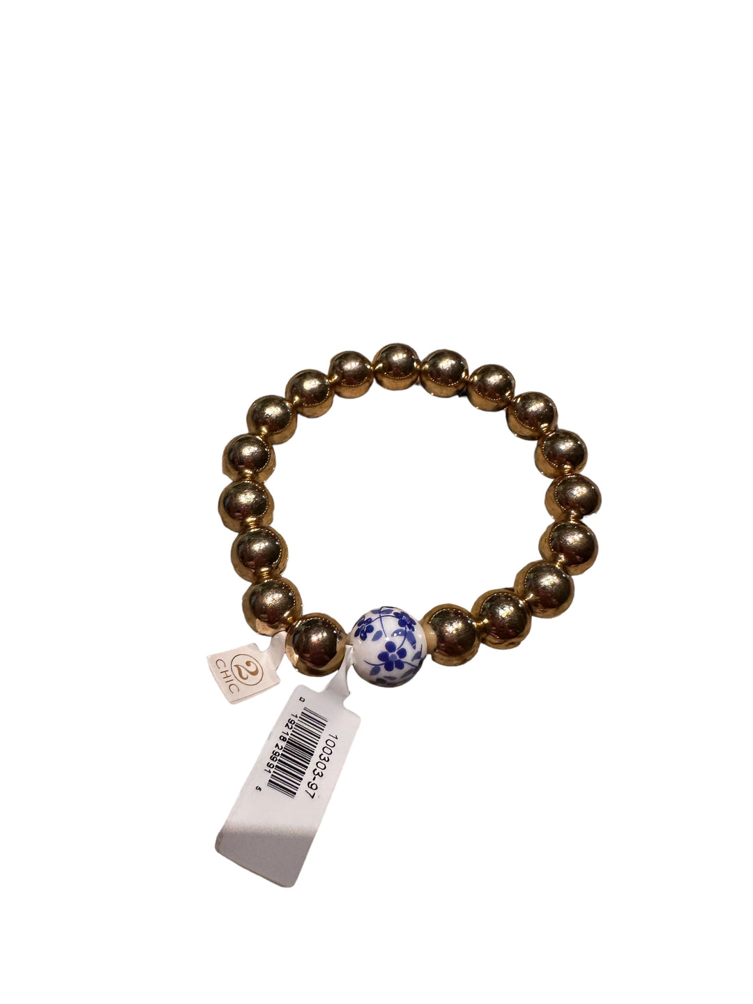 Chinoiserie Chic Stretch Bracelet with shiny gold beads, one white bead with blue floral patterns. Sizes available: S, M, L.