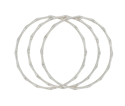 Joss Bangle silver hoop earrings with textured bamboo design. Available in small, medium, and large sizes.