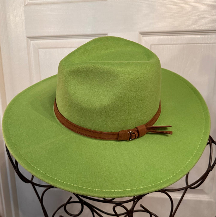 Wide-brimmed light green wool hat with brown leather band and small buckle. Available in sizes S, M, L.