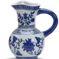 White porcelain Canton Small Pitchers with blue floral patterns, wide spout, curved handle. Available in 8oz and 16oz sizes.