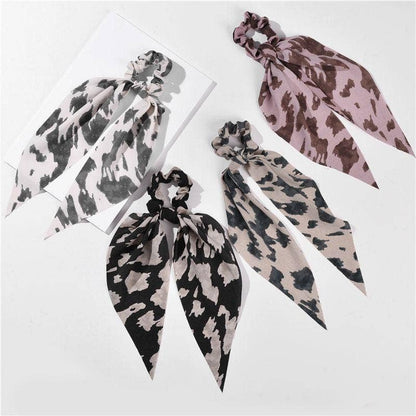 Striped Hair Scrunchie Scarves in pink, navy, light blue, and black. Available in small, medium, and large sizes.