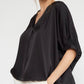 This stylish black Satin V Neck Plus top offers a sleek, flattering option for any wardrobe. Key features include a deep V neckline and elegant draped sleeves. Available in plus sizes.