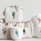 The product is a range of canvas bags, sturdy and durable for everyday use. Available in various sizes to accommodate different needs. Accompanying the bags are 4-inch Stoneware Mugs, decorated with charming garden prints. The mugs display excellent craftsmanship, with a comfortable grip and glossy finish, suitable for hot or cold beverages.