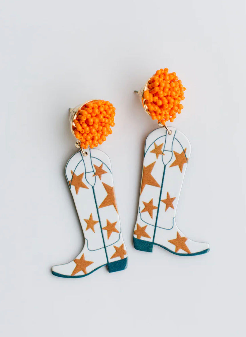 Orange beaded studs with dangling white cowboy boots, orange stars, blue accents. Sizes available: one size fits all.