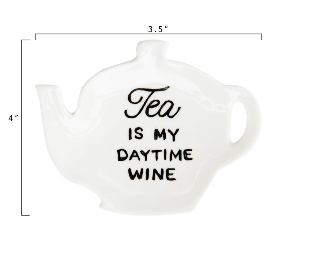 White stoneware teapot dish with "Tea is my daytime wine" in black text. Size: 4" tall, 3.5" wide.