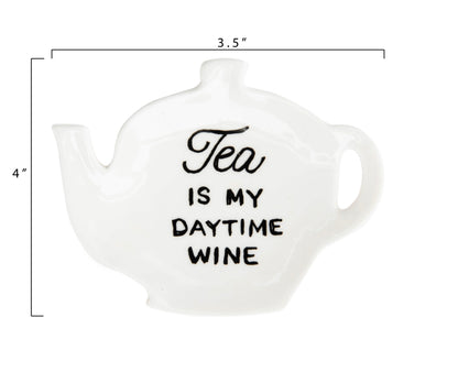 White stoneware teapot dish with "Tea is my daytime wine" in black text. Size: 4" tall, 3.5" wide.