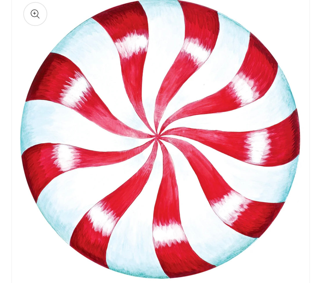 Round peppermint placemats with a red and white spiral pattern.