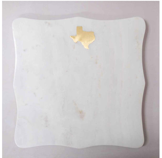 White marble serving board with scalloped edges, gold Texas outline at top center. Available in various sizes.