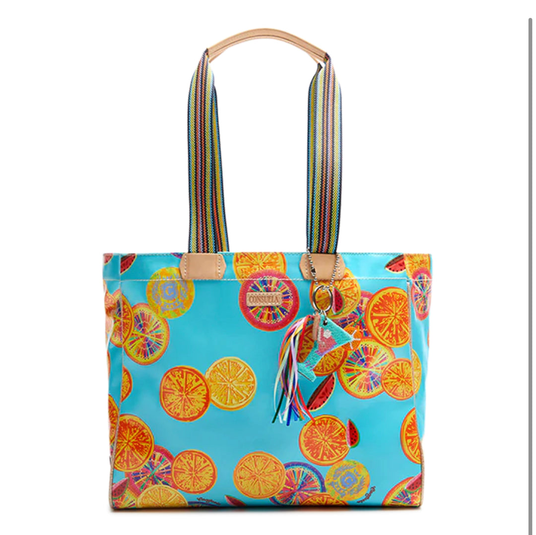 Journey Tote, Cha Cha: turquoise with citrus patterns, rainbow straps, tassel keychain, zipper pocket. Sizes: Small, Large.