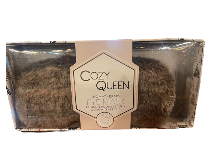Cozy Queen Aromatherapy Eye Mask, brown and furry, packaged in a clear box with English and French labels. Sizes available.