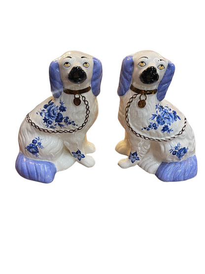 Ceramic Blue and White Staffordshire Dog figurines, 8 3/4" tall, with blue floral patterns, gold collars, and pendants.